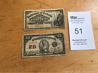 Photo showing front sides of two Canadian Dominion 25 cent shin plaster notes, both heavily worn with visible creases and discoloration.