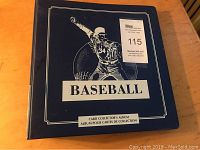 Blue hardcover binder with 'BASEBALL' and batter graphic on front cover.