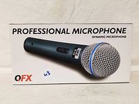 Box showing front image of QFX professional microphone with model M-158
