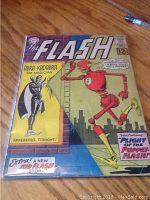 Front cover of The Flash issue 133 showing the title, price (12 cents), and artwork of a puppet Flash and Abra Kadabra the magician.