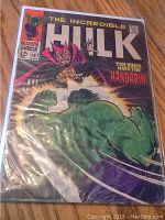 Full cover photo of The Incredible Hulk comic issue 107, showing Hulk and villain Mandarin with comic title and Marvel logo