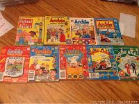 Photo showing nine colorful Archie comic digest books laid out.
