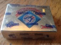 Unopened 1992 Donruss Championship Season baseball card box, shrink-wrapped with gold foil and Toronto Blue Jays commemorative logo.