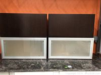 Two cabinets side by side, each 30x13x15 inches. Left cabinet has dark wood front, right cabinet has white framed frosted glass door.