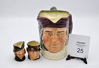 Set of three Royal Doulton Toby mugs together with auction card and key.