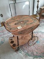 Full view of serving cart with drop-leaf top raised