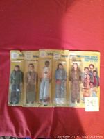 Five Mego Welcome Back Kotter figures packaged on yellow cards with blue logo.