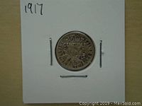 Front side of the 1917 France Silver 50 Centimes coin showing the denomination and floral design.