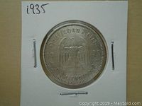 Obverse side of the 1935 Germany 5 Reichsmark silver coin showing eagle and inscriptions.