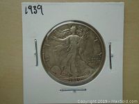 Obverse (front) of 1939 Walking Liberty Half Dollar showing Lady Liberty walking with sun and branches