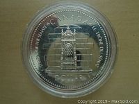 Reverse side showing the throne symbol and Canadian denomination inscriptions.