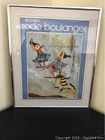 Front view of framed lithograph art piece showing three girls on swings with artist's name and title visible.