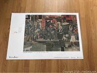 Full view of one side of the laminated print showing Romare Bearden's artwork titled 'The Dove' from 1964