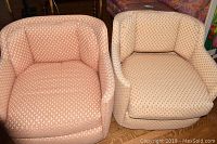 Two Henredon upholstered club chairs side by side showing upholstery and shape.