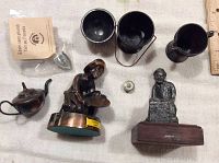 Photo showing all items in the lot: two figurines, bucket, pitcher, teapot, bowl, tiny pewter iron, and pin in packaging.
