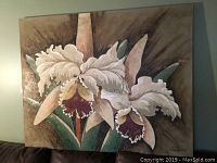 Full view of the oil painting showing the white irises with green leaves on brown background.