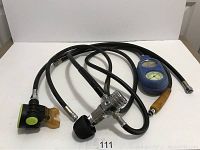 Complete set of vintage Sherwood regulator with hoses and mouthpiece displayed on white background.