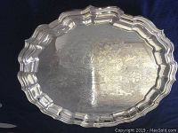 Photo of full tray showing overall shape and ornate scalloped edge