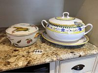 Photo showing two serving dishes on granite countertop: a white soup tureen with colorful floral decoration and matching underplate; and a Royal Worcester covered dish with corn and fruit design.