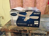 Boxed Harbor Breeze Riverview 36 inch white ceiling fan, showing model number and packaging.
