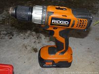 Side view of Ridgid rechargeable drill showing torque settings and battery detail.
