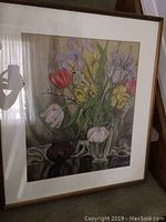 Full view of the framed pastel floral artwork showing the composition and frame.