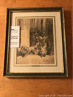 Full view of framed Victorian engraving showing several dogs in an outdoor stone courtyard or alley.