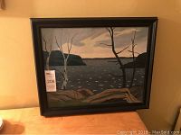 Framed painting in room