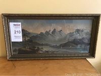 View of the oil painting on canvas framed under glass showing the complete artwork and frame.