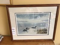 Framed limited edition print showing full visible frame, double matting, and artwork.