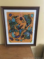 Full view of framed print “Animal Spirits” showing overall condition and frame style