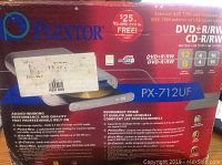 Photo of original Plextor PX-712UF external DVD burner box showing product name, features and specs.