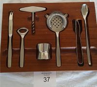 Full view of 7 piece bar set in wooden tray showing all included tools