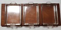 Full view of teak wood tray with three inset glass dishes in place, showing rectangular shape and cutout handles.