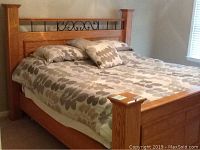 Full assembled king-size bed with bedding