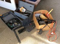 Wide image showing Craftsman plastic toolbox, gray metal toolbox and cardboard box full of tools and hardware
