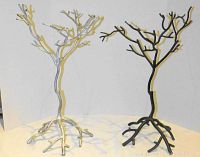 Photo showing both metal branch displays, one black and one silver, on white backdrop from front angle.