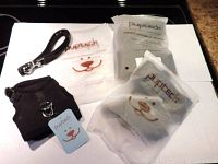 Three new black nylon mesh halter collar and leash sets for cats or dogs, still in clear Pupteck packaging, displayed on white surface.