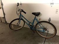 Full side view of the blue Diamond Back bicycle showing overall condition and design.