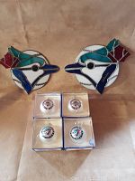 Two signed Toronto Blue Jays stained glass pieces with red maple leaves and baseball design, plus four boxed Toronto Blue Jays 1992 World Series win Christmas ornaments.