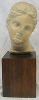 Front view of the bust showing detailed facial features and head shape