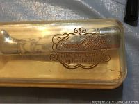 Close-up of Carvel Hall Fine Cutlery logo on plastic case lid showing brand and maker Briddell