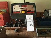 Close up of Craftsman saw motor label showing 2.55 HP power rating and the swtich with pull on, push off instructions.