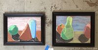 Two framed pastel paintings side by side on a floor, showing geometric and organic shapes in still life.