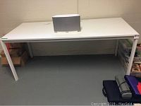 Sonos speaker placed on white utility table