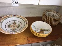 Overall view of the large serving bowl and smaller pasta bowls stacked in two piles.
