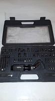Closed view of the Alltelft ratchet screwdriver set case showing the bits and socket organization inside a molded tray.