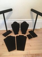 Full view of all 7 black velvet jewellery display items showing their shapes and types