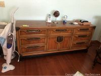 Full front view of wood dresser showing overall design and condition