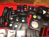 Wide top-down view of all items on red container lid